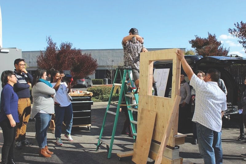 Rick Nelson, Senior Associate at MBH Architects, Alameda, Calif., demonstrates the proper installation of materials to MBH professionals