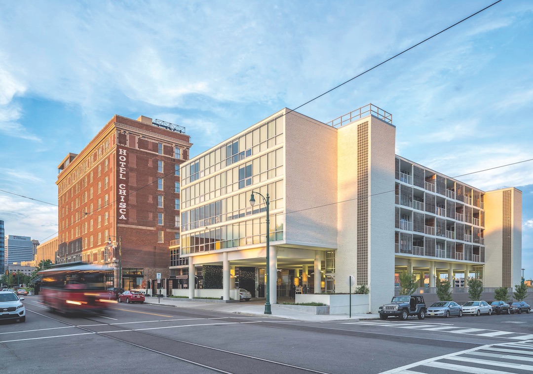 the red-brick 1913 Hotel Chisca and the now frosty-faced 1961 Mid-Century Modern addition. 