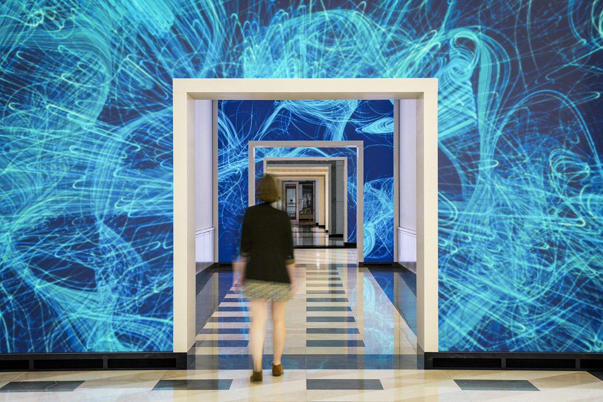 NBBJ acquires immersive technology design studio ESI Design Terrell Place in Washington, D.C., features 1,700-sf of motion-activated LED displays. Photo: Caleb Tkach courtesy EDI Design/NBBJ