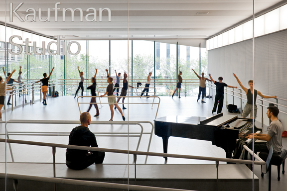 New glass walls make dancers at the Glorya Kaufman Dance Studio visible to neigh