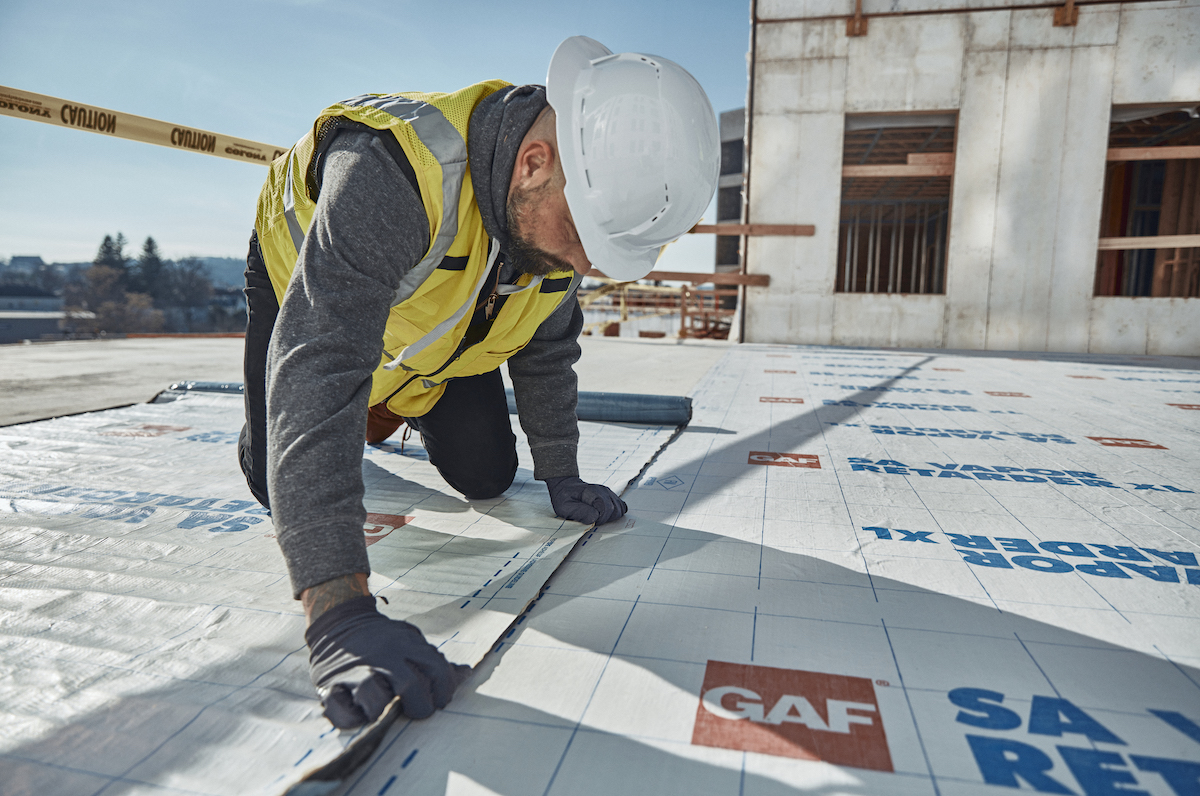 GAF SA Vapor Retarder XL being installed at The Revington rental housing complex, Worcester, Mass. Photo: Courtesy GAF