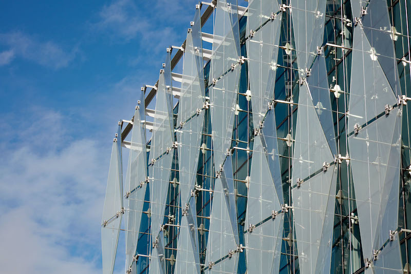 Exterior details of facade's folding glass panels.