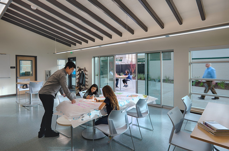 Kennedy Middle School Administration/Family Center interior with students drawing