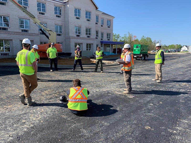 Contractors practicing social distancing on jobsite.