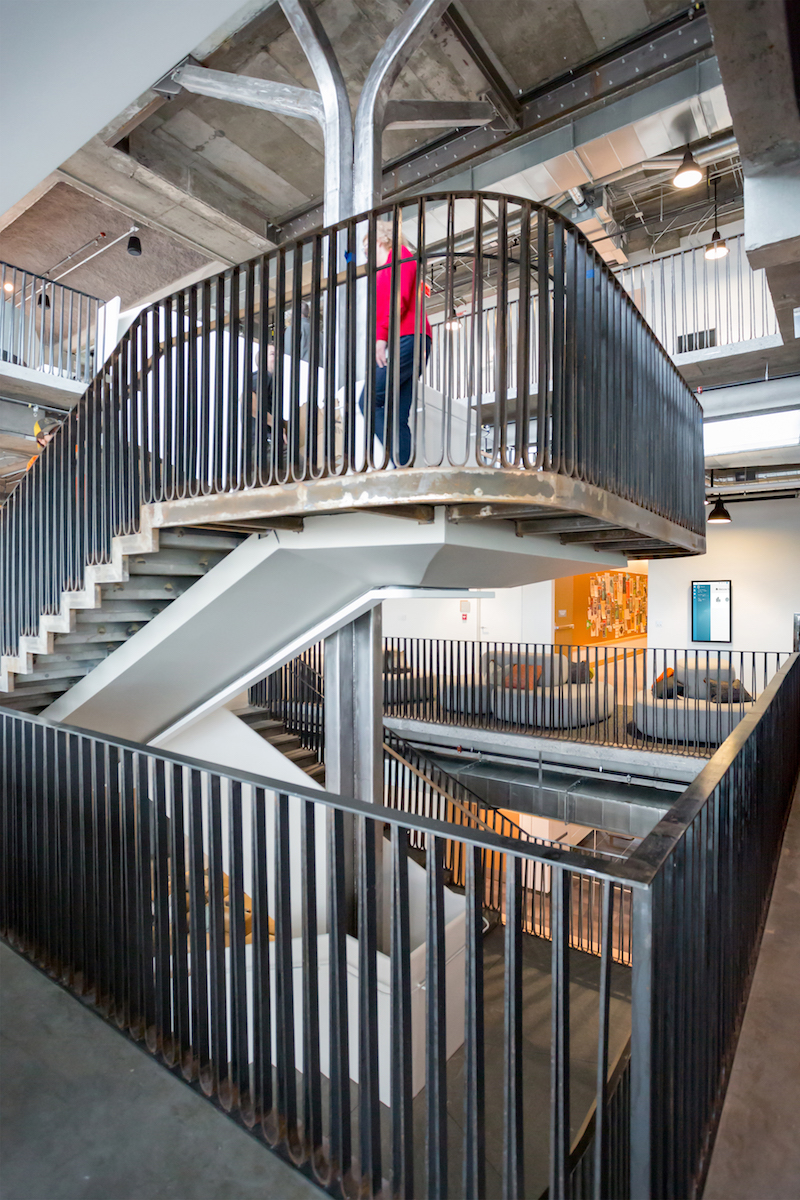 Woman walking down a staircase