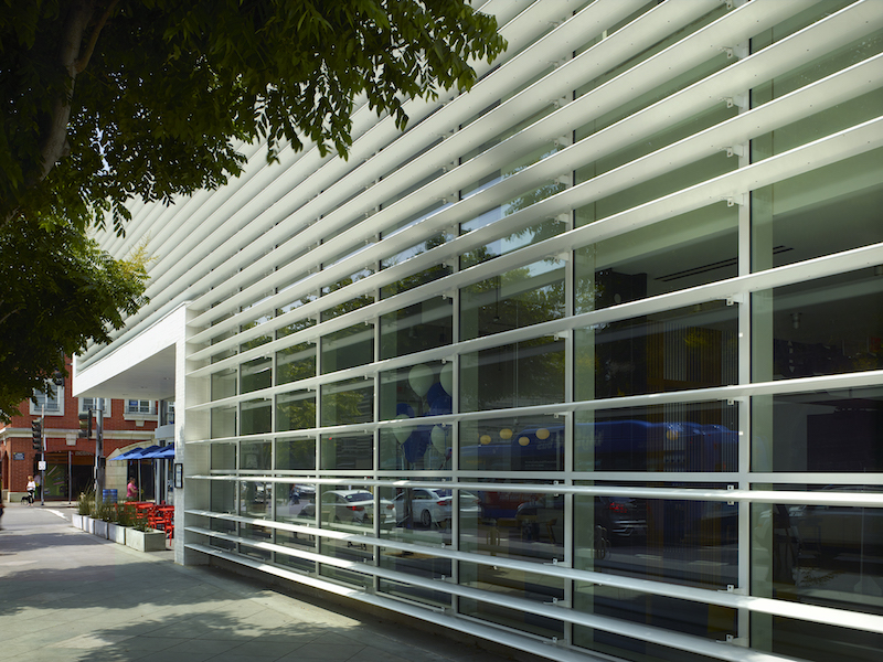 One of the glass and aluminum facades of the Capital One Cafe 