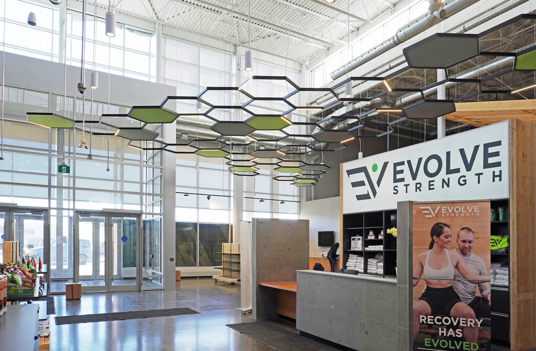 An acoustical grid above Evolve Strength's reception area. Images: Bold Interior Design