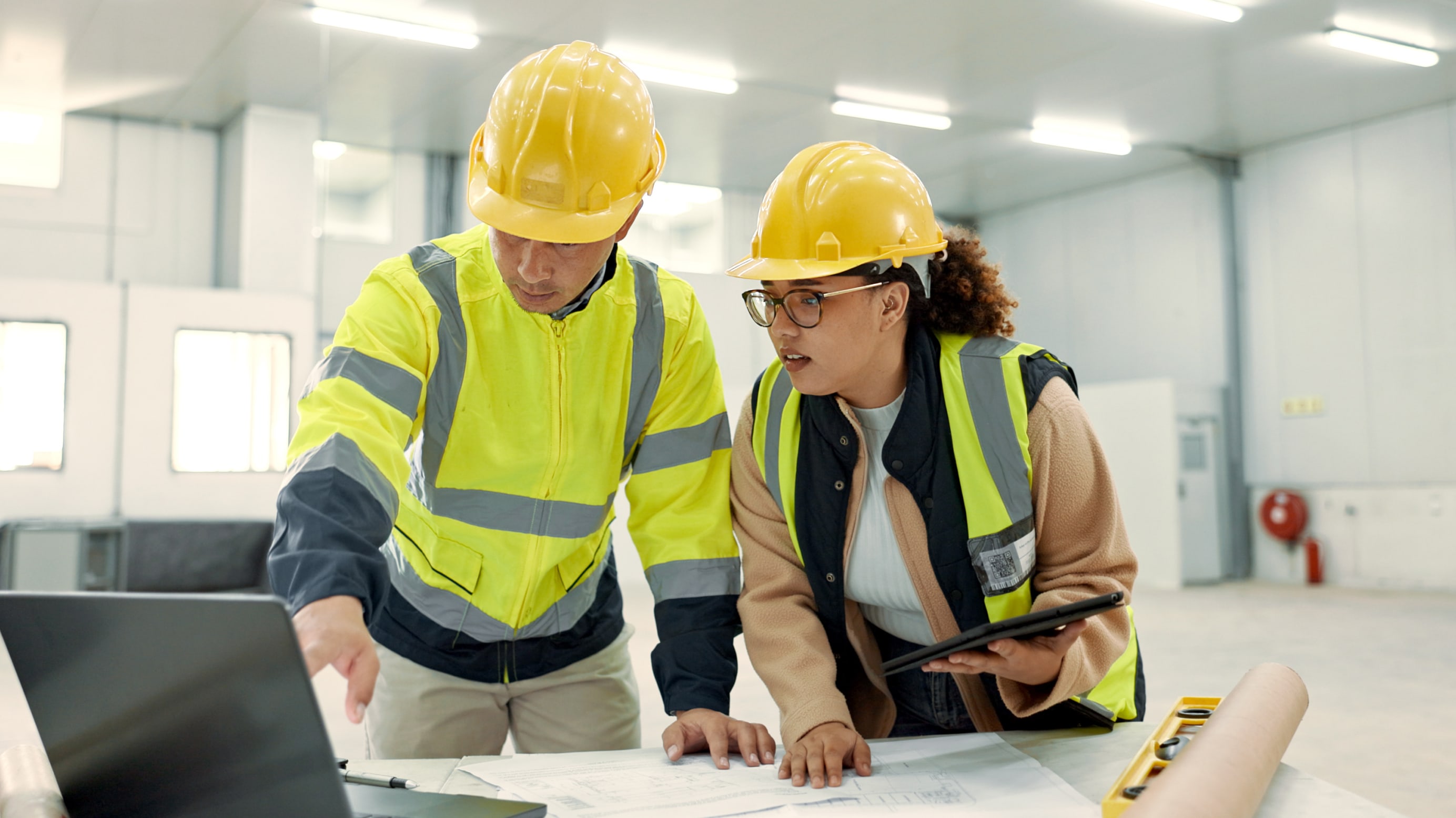 Architecture people, teamwork and laptop for construction site planning, floor plan and building design