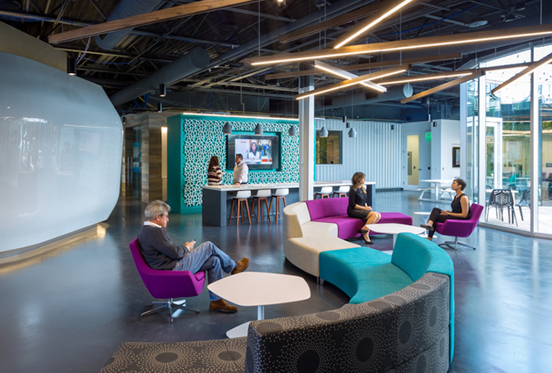 People sitting in an indoor collaboration space