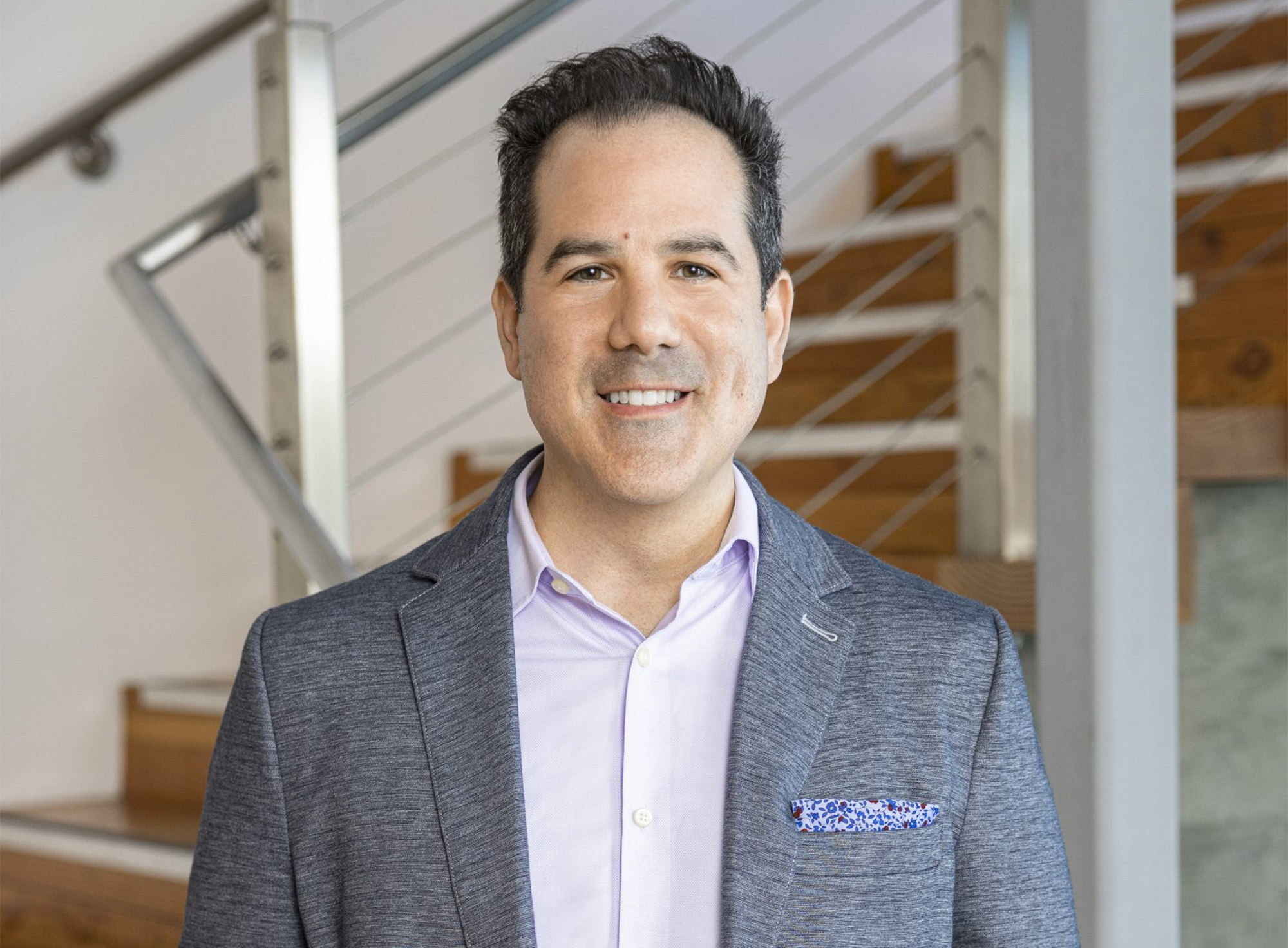 Headshot of man in business suit