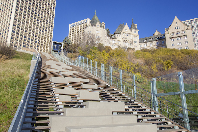 The Kebony wood stairs and concrete seats running parallel to the funicular 