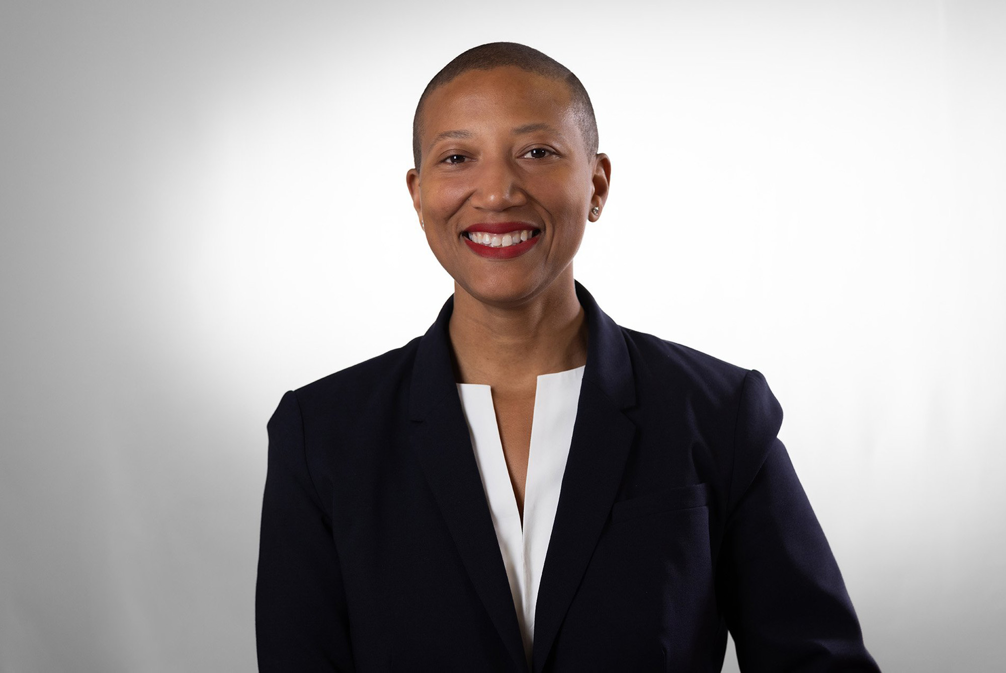 Architect, businesswoman, 40 Under 40 winner headshot with white background