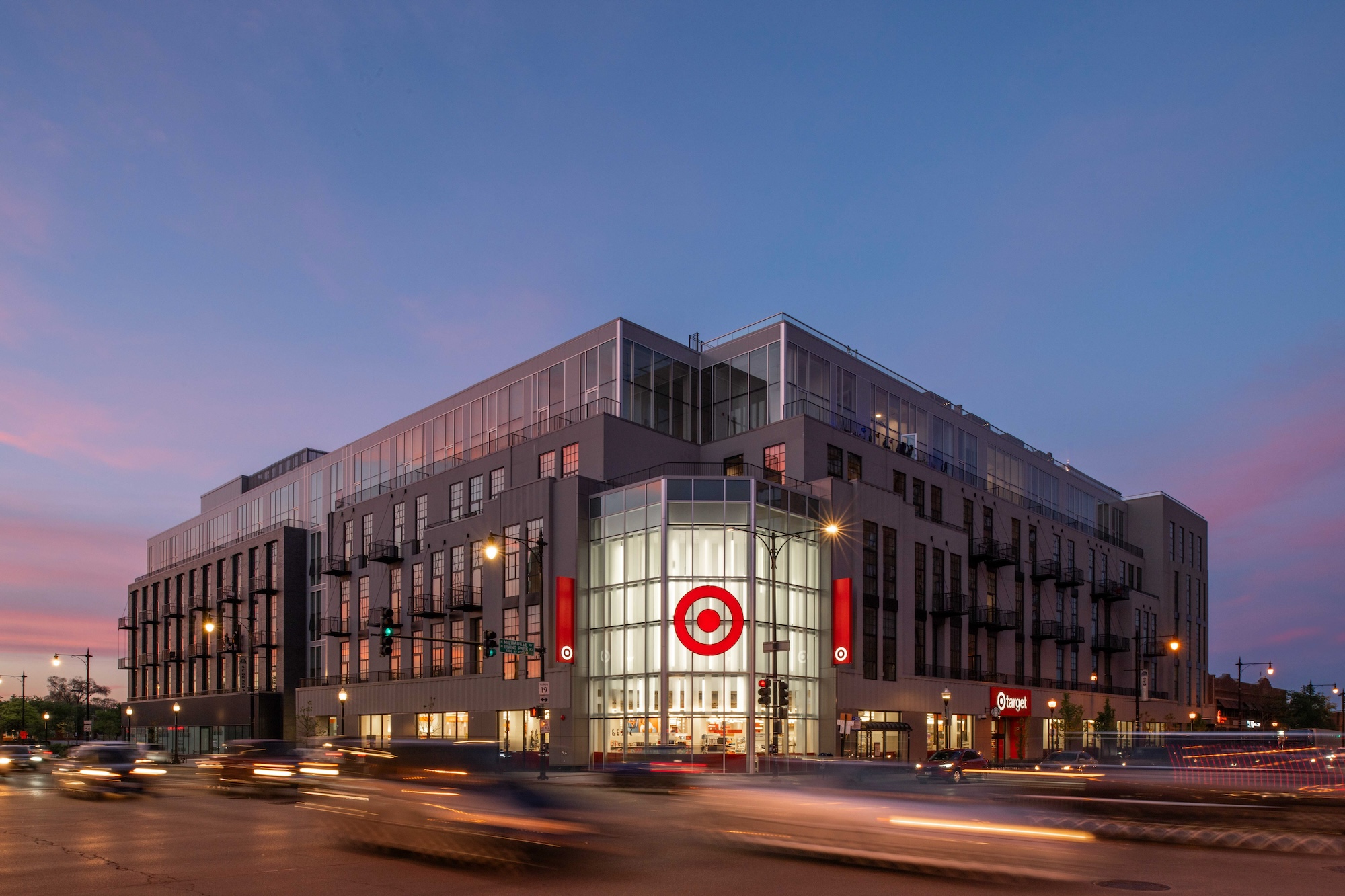 Adaptive reuse of Sears store into mixed-use housing with ground-floor Target retail