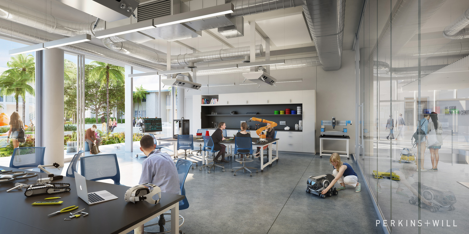 Students working a lab space