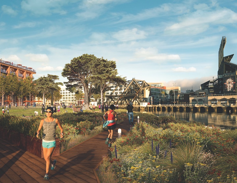 People running through a mixed-use waterfront community in San Francisco