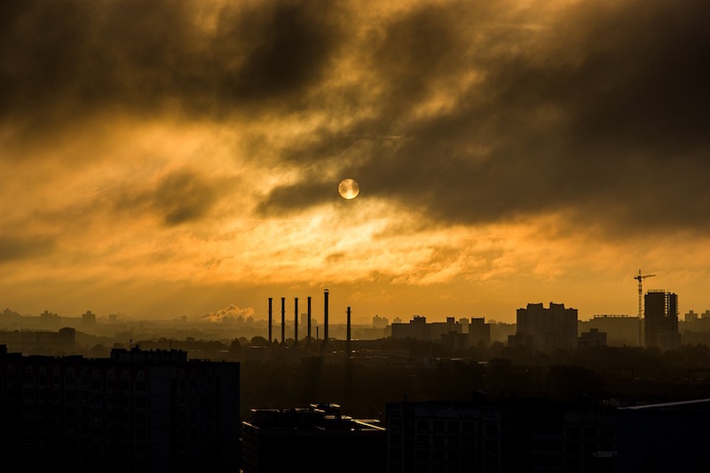 Smog in the sky over a manufacturing facility