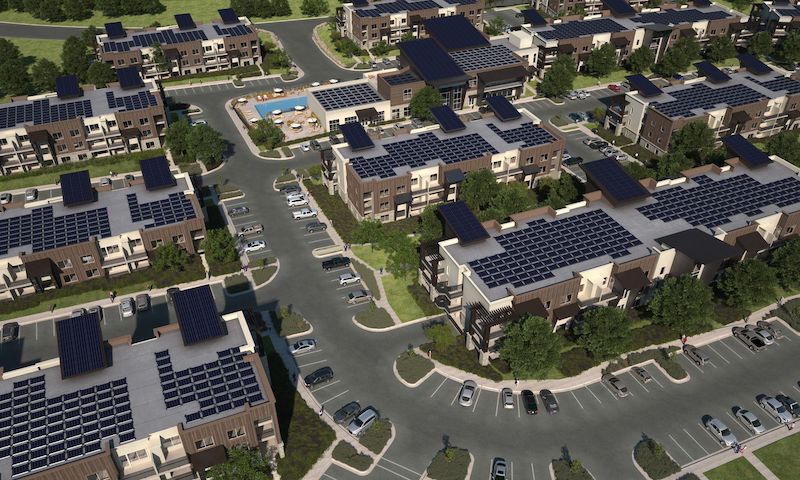 Aerial view of soleil lofts with solar panels