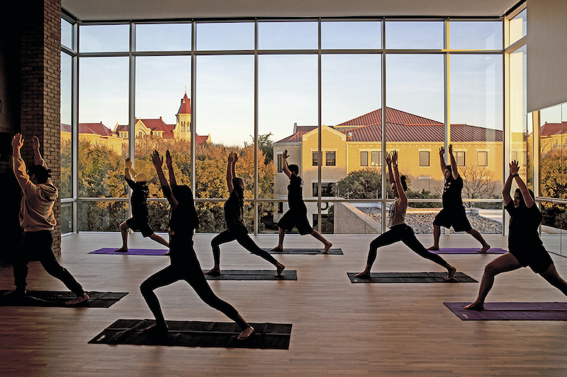 Students doing yoga at St. Edward's