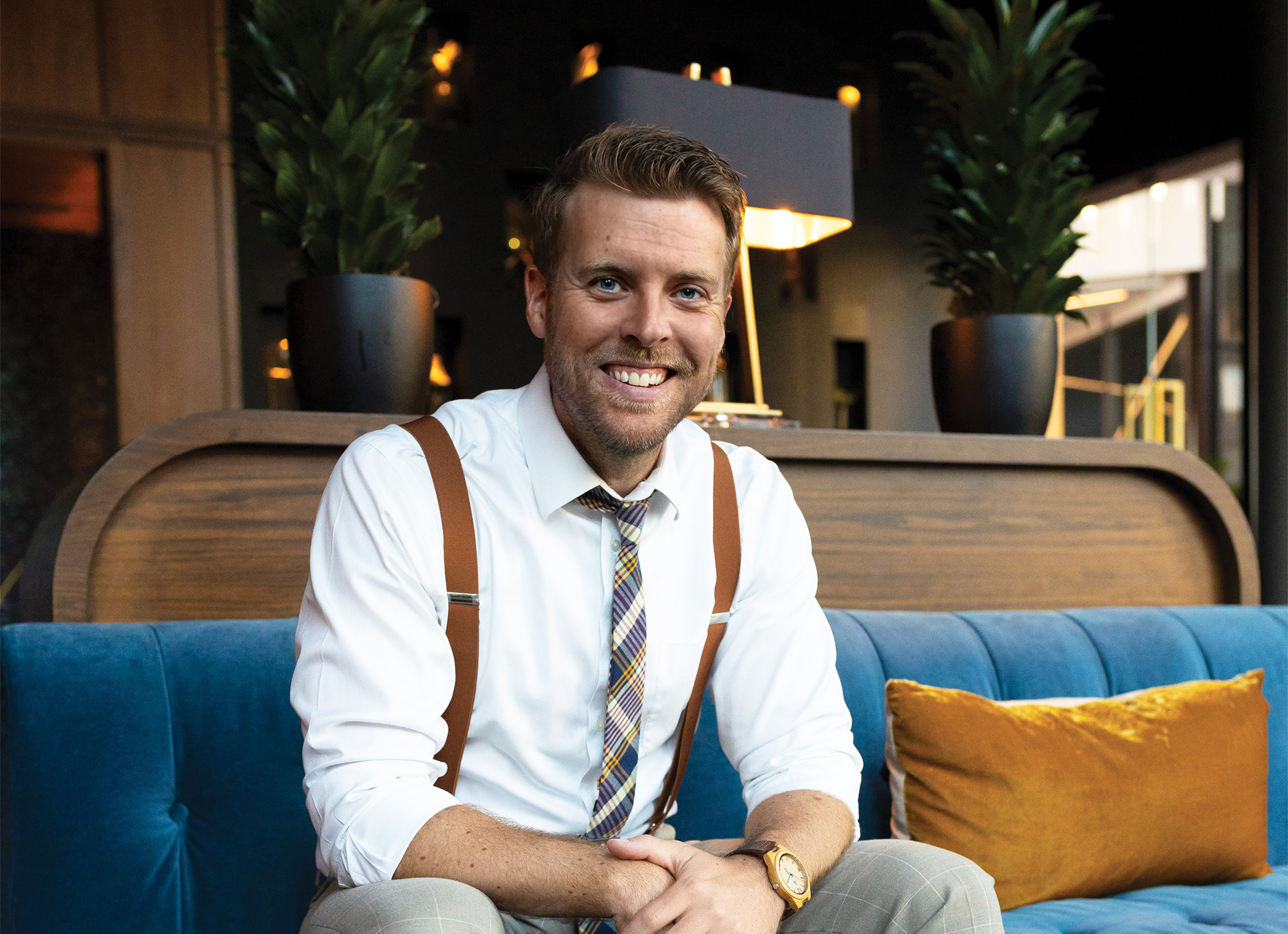 Zach Klebba headshot on couch