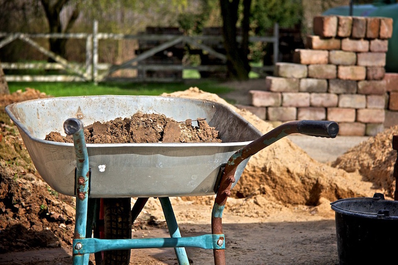 A wheel barrow at a construction site