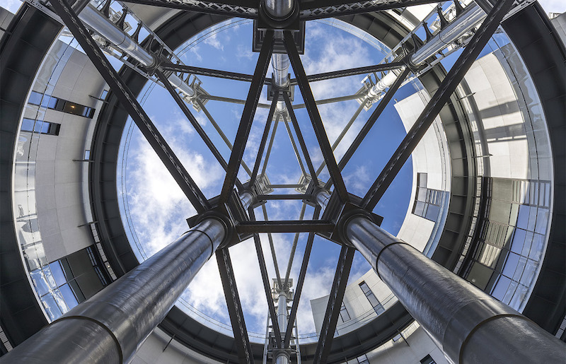 Inside a center courtyard space in the gasholders London