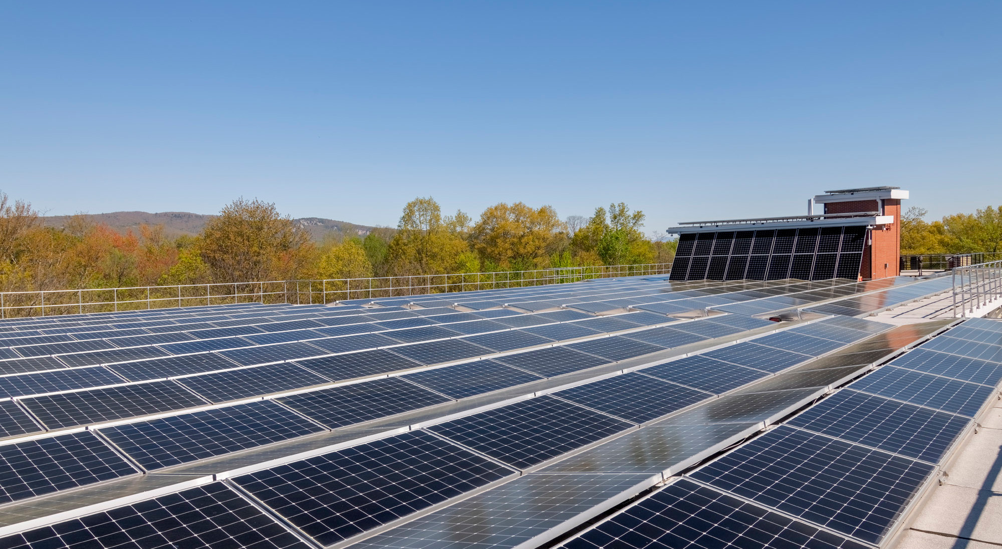 Solar panels on rooftop of multifamily building