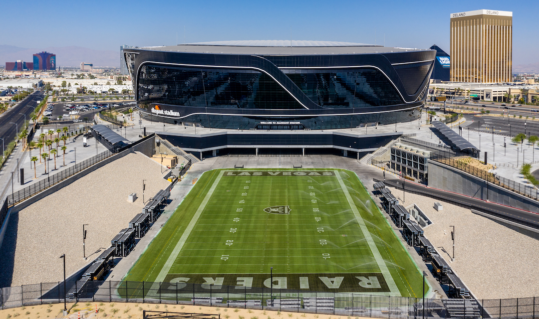 Allegiant Stadium with grass field outside