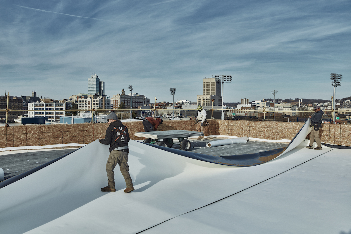 Capeway Roofing Systems crew on The Revington roof