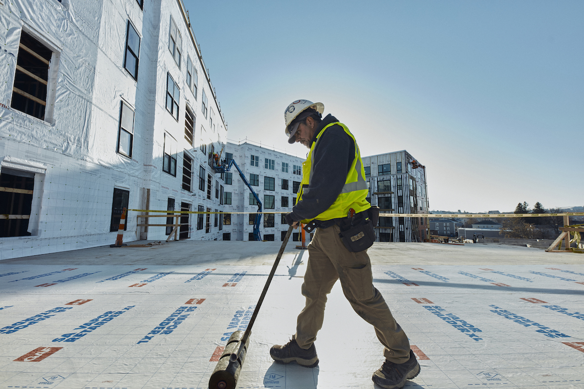 Rolling vapor retarder on The Revington roof