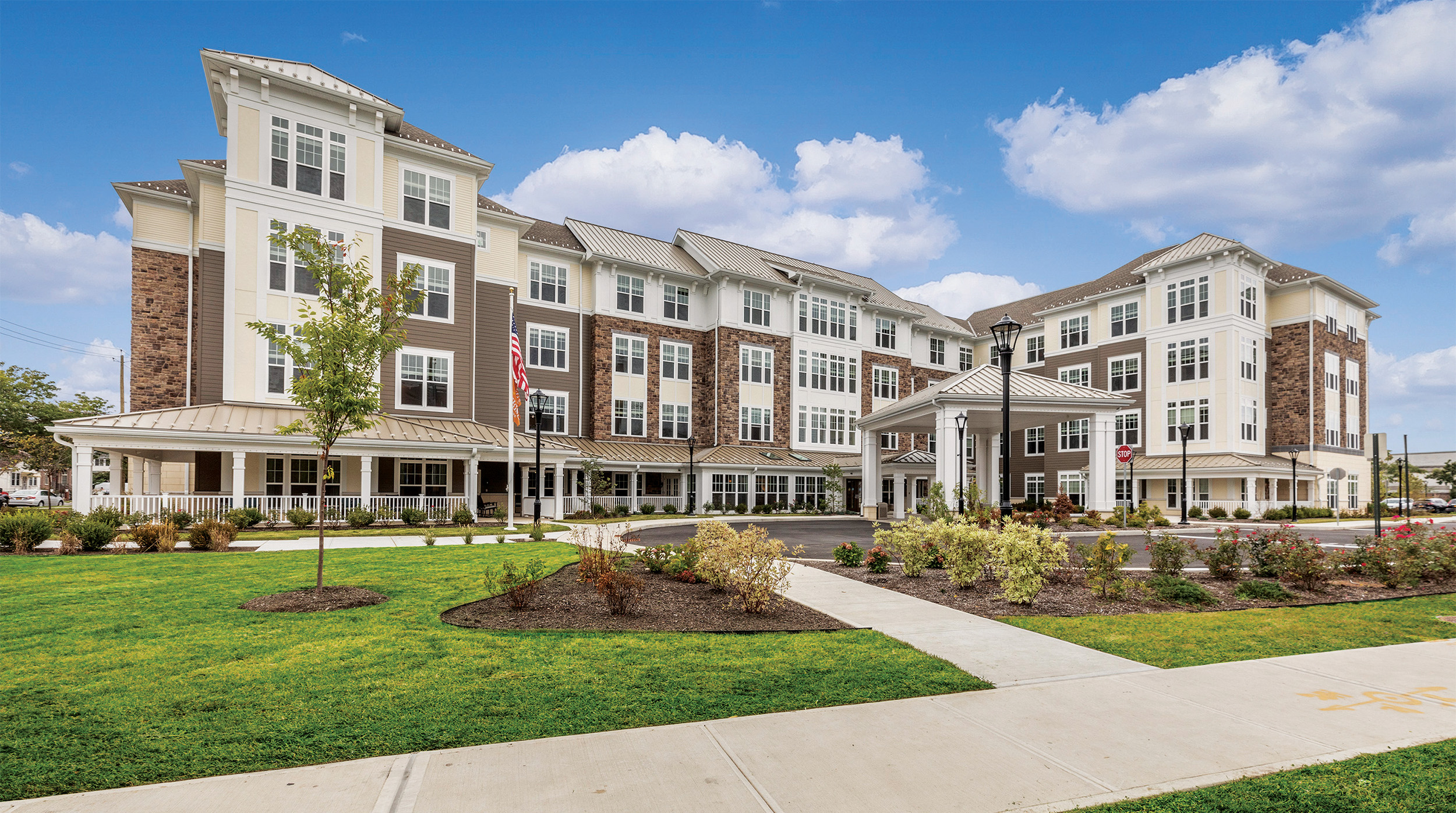 Senior living facility exterior on sunny day