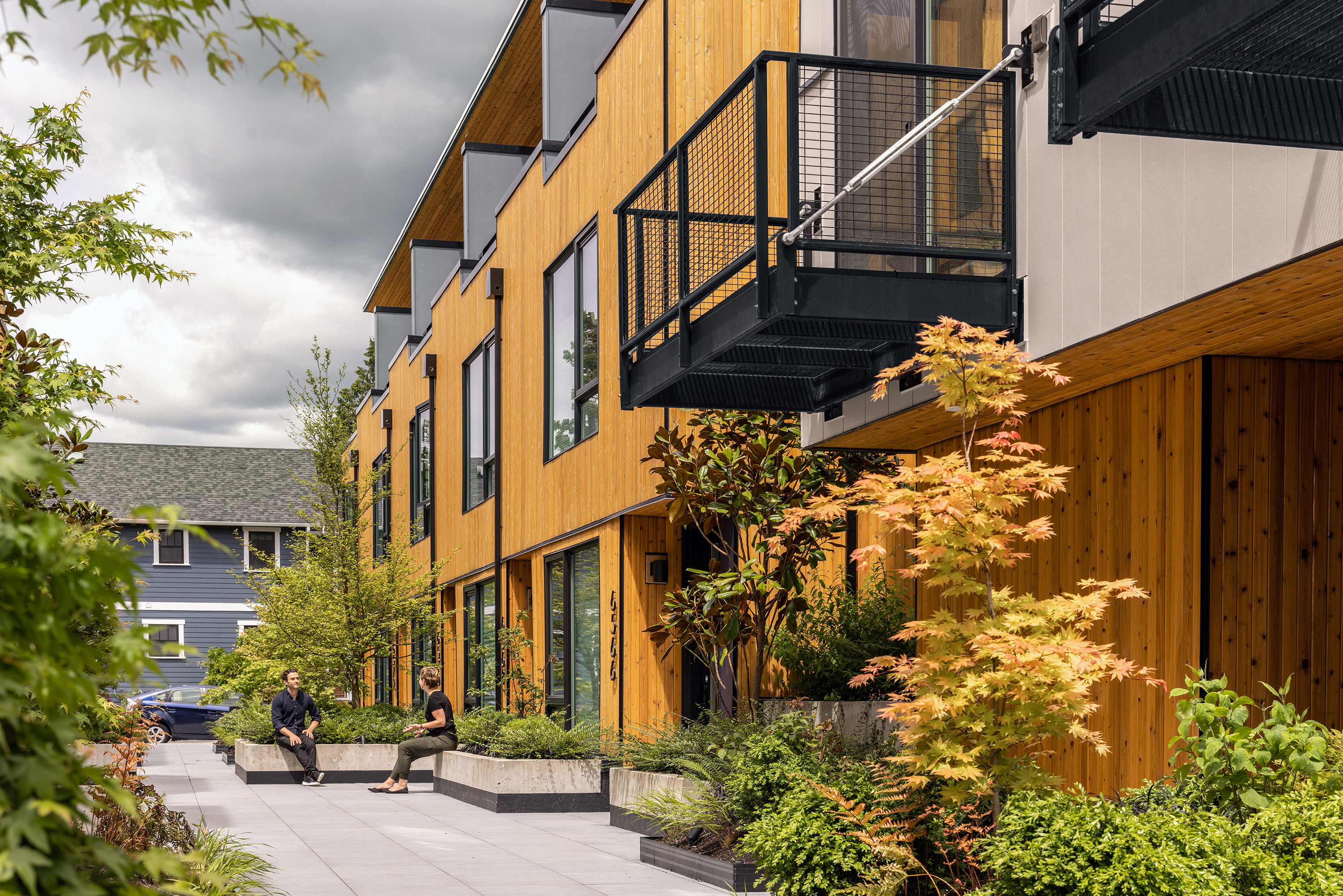 Each townhouse has a balcony and private patio space.