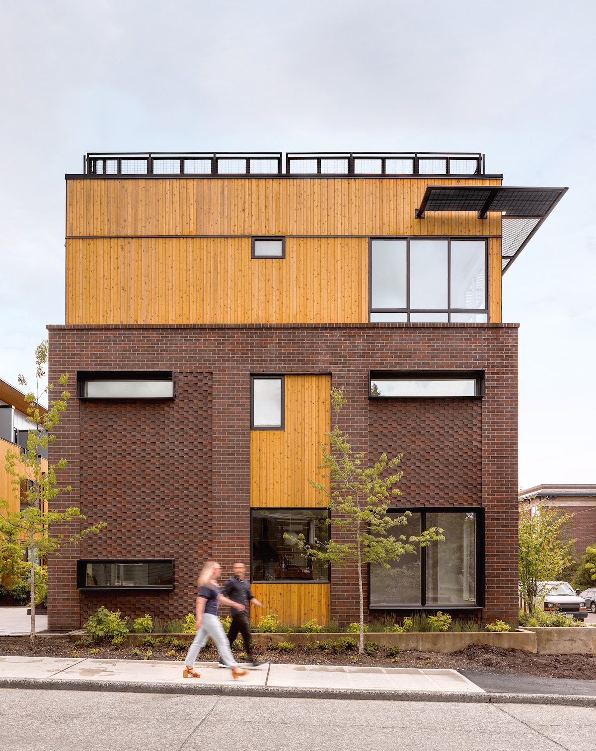 Extruded steel lintels around windows to support the brick. 