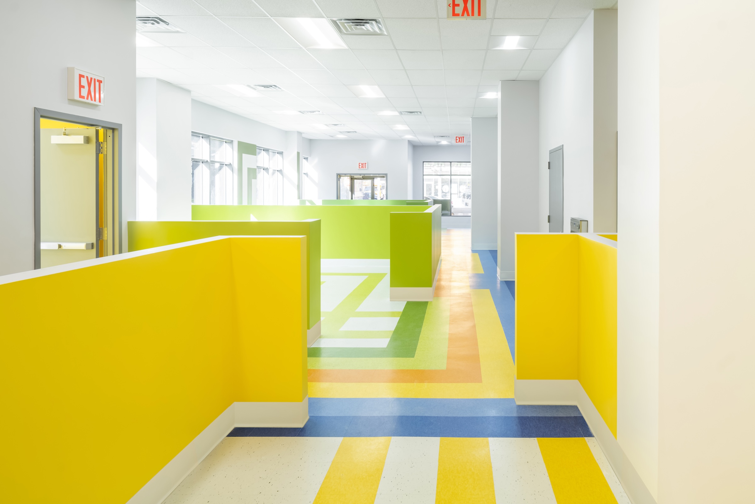 Brooklyn's colorful Van Sinderen Plaza affordable housing project includes retail, public spaces. Photo courtesy GLUCK+