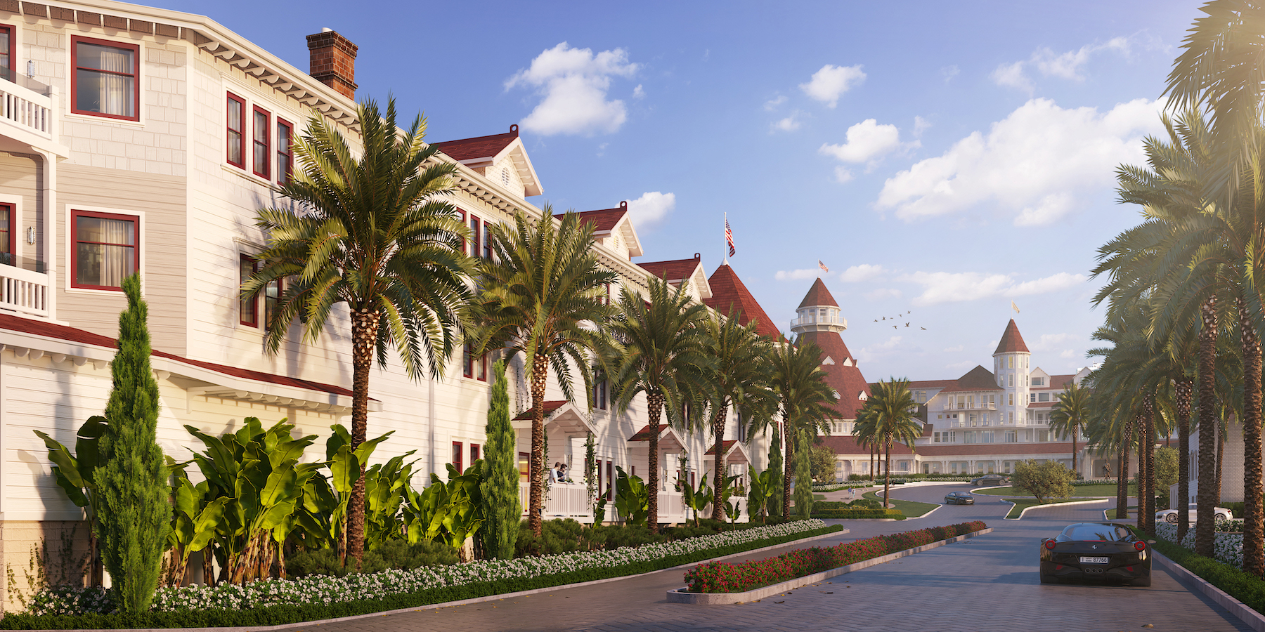 A brick-paved entry road borders landscaping.