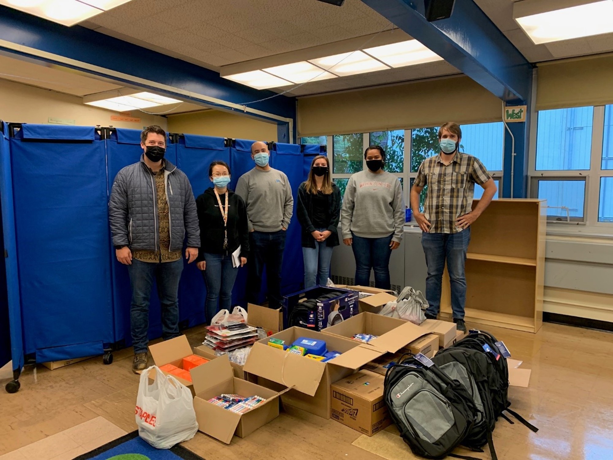 Our team members hosting a backpack drive for schools in Washington. Photo: Skanska USA