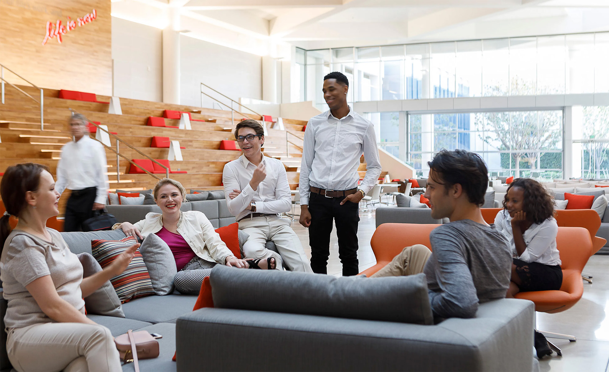 Office workers chatting