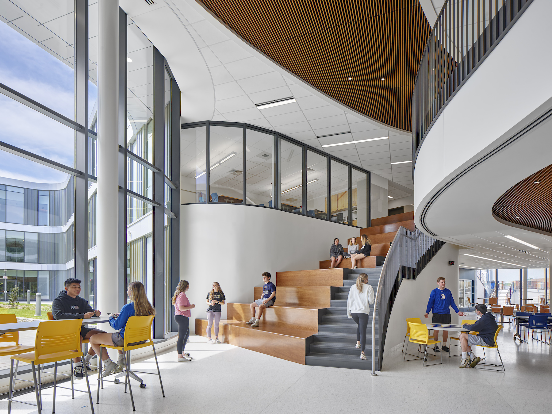 The library on the second floor connects with the cafeteria on the first.