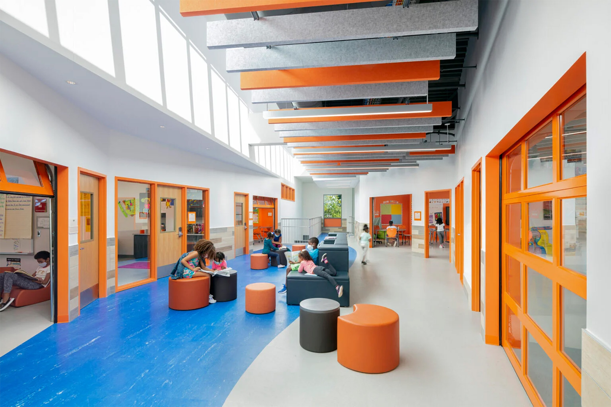 Garage Doors open from a central hallway into classrooms at John Lewis Elementary School in Washington, DC 