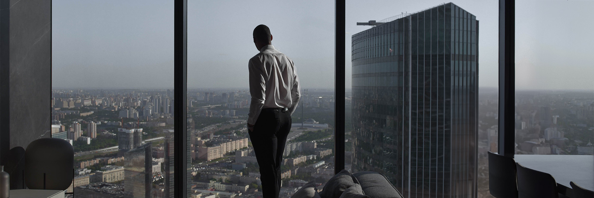 Man in Shirt in Luxury Apartment in City