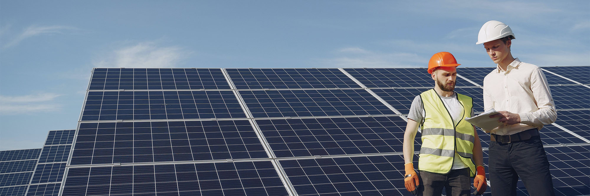 Electricians Inspecting the Solar Panels