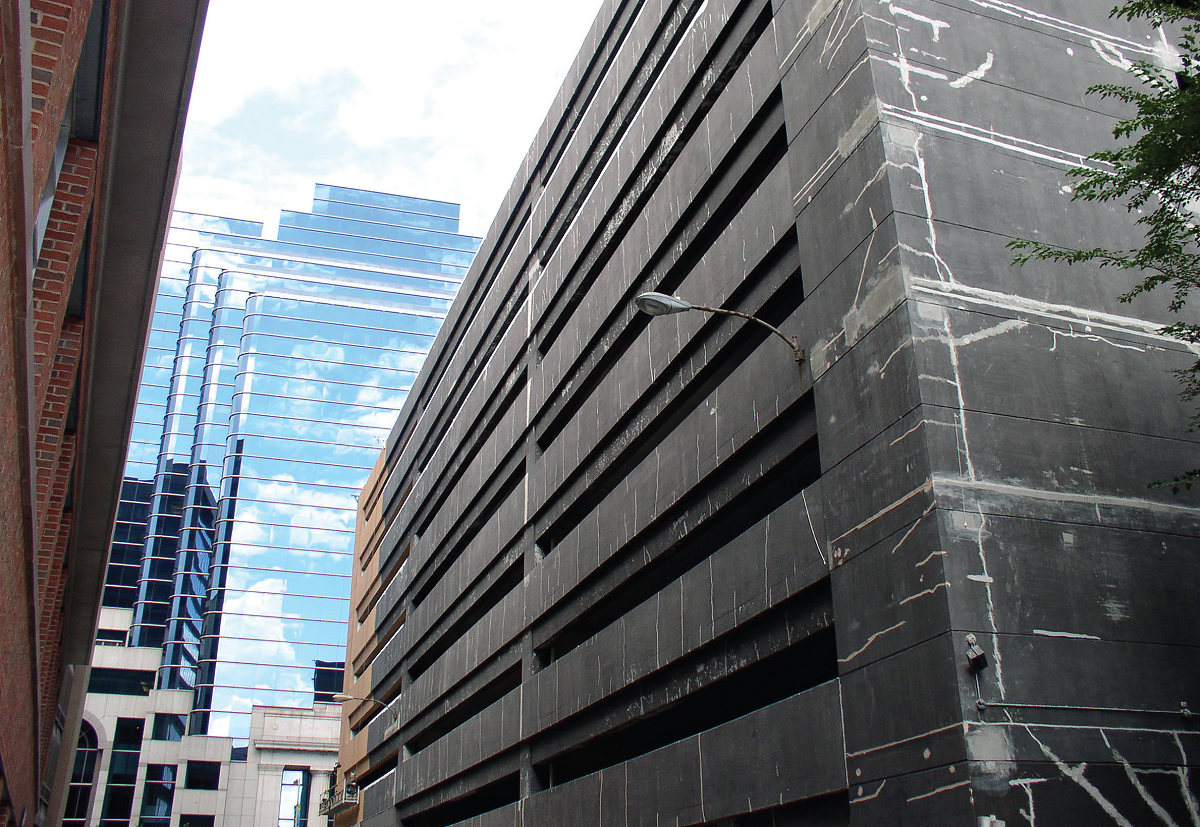 Shear cracks riddle the exterior wall of this urban parking structure. Courtesy Hoffmann Architects