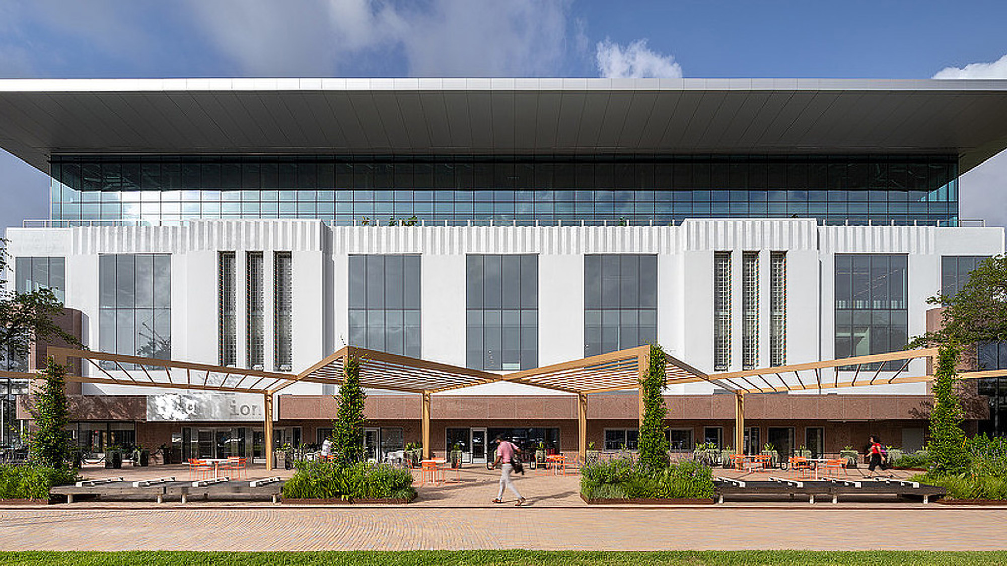 A building with a large glass front.