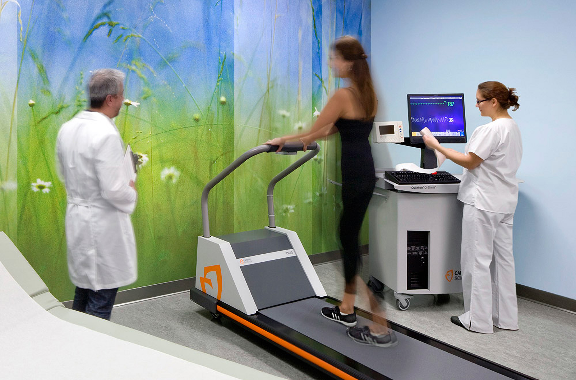 Woman on treadmill in healthcare facility