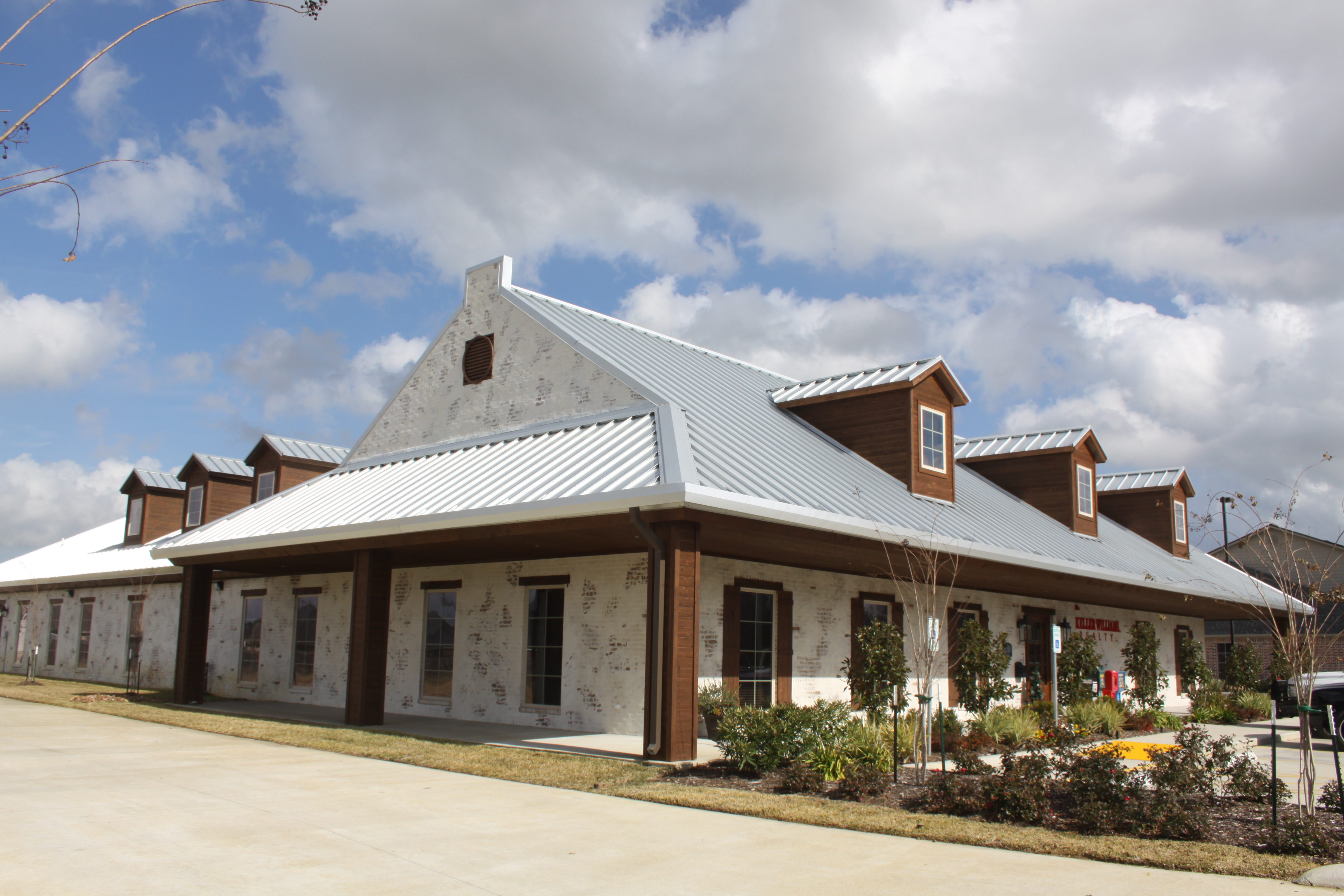 A custom metal building serves as the home of Ron Cleveland Construction Company