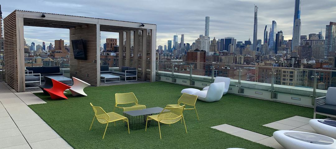 Rooftop paving system in a multifamily housing community.