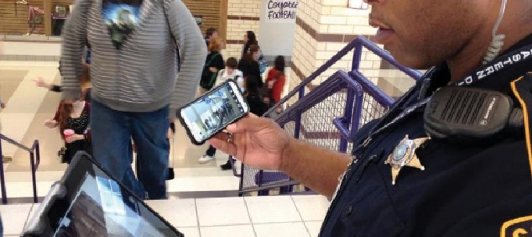 Collin County Sheriff Deputy George White checks a hallway in one of Anna (Texas