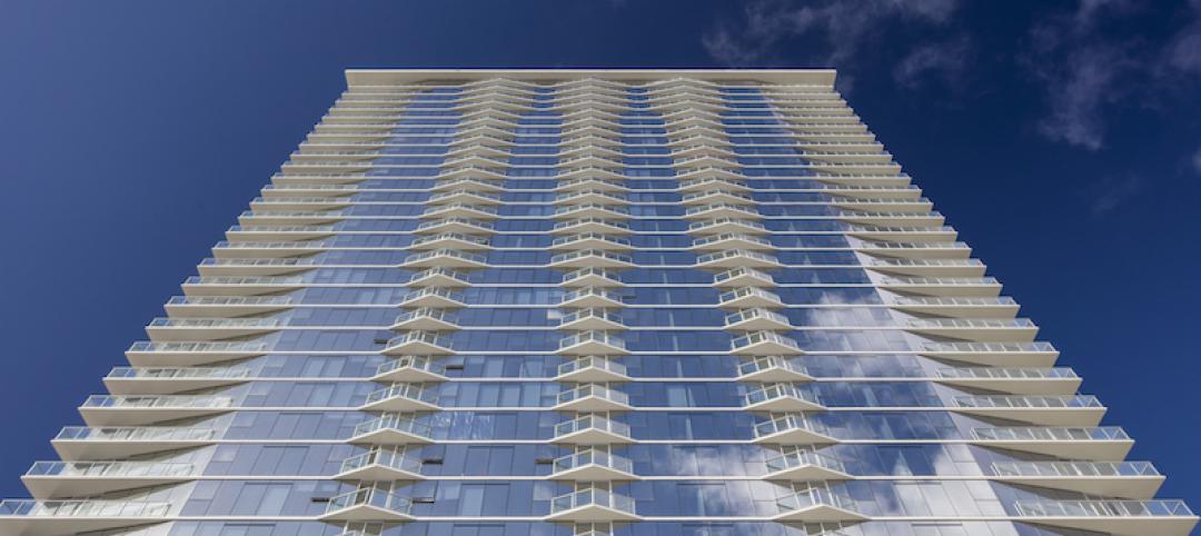 A high-rise hotel shot from below