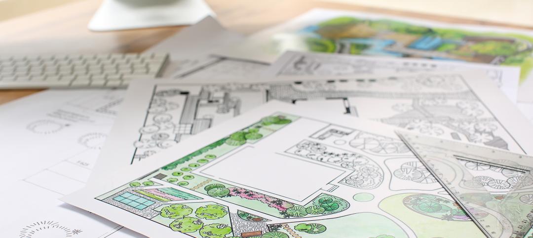 Landscape architect drawings on office desk