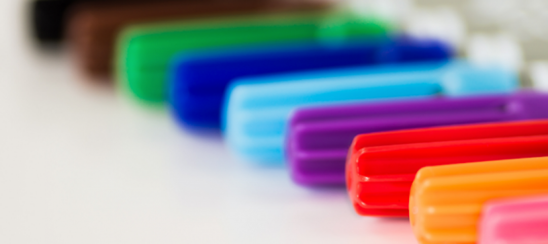 A closeup of markers lined up on a surface