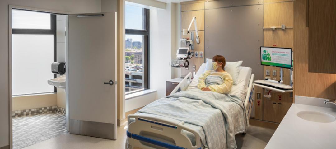 Woman wearing a mask in a hospital bed